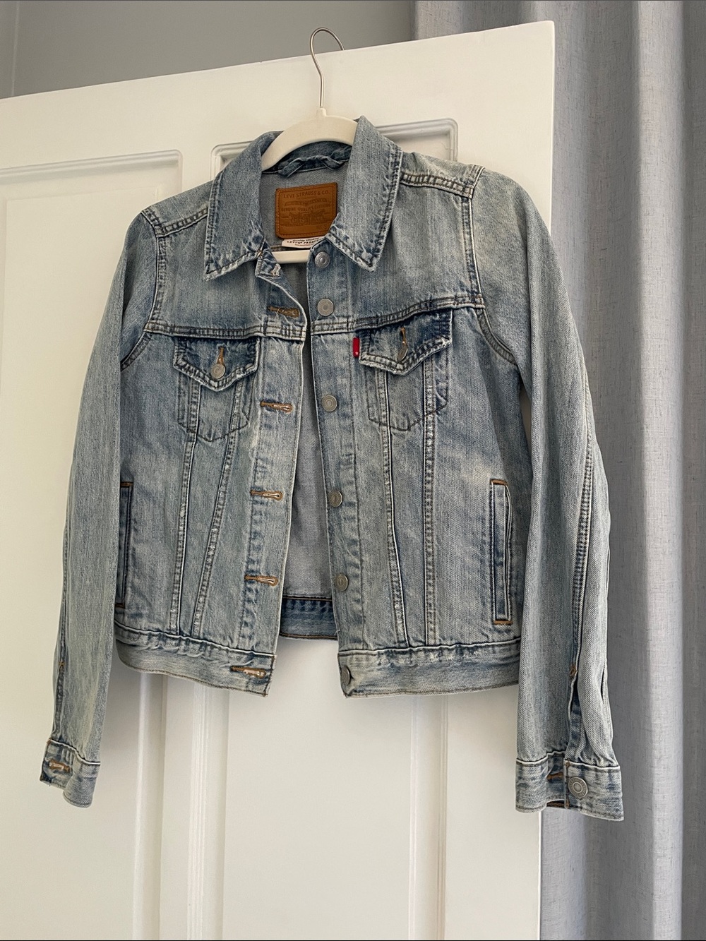Levi's Light Wash Denim Jacket in Faded Blue. Small